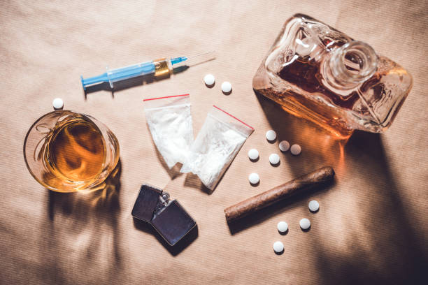 Hard drugs and alcohol. stock photo