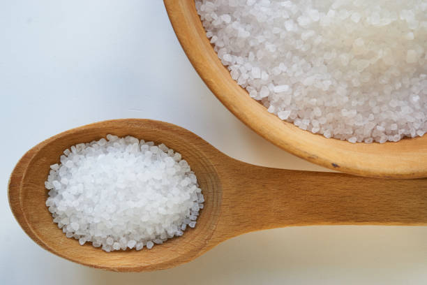 istock sea salt in a wooden bowl and spoon 817847196