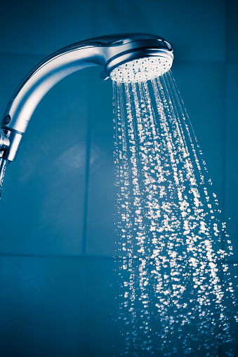 refreshing shower with water stream, closeup view