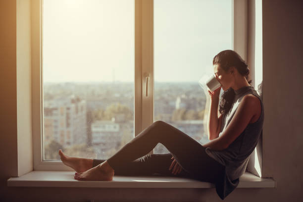 istock Girl resting and thinking at home 817852510