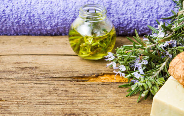 istock Rosemary oil and soap for herbal treatment 817859424