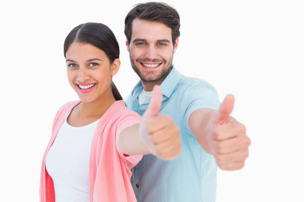 istock Happy couple showing thumbs up 817864058