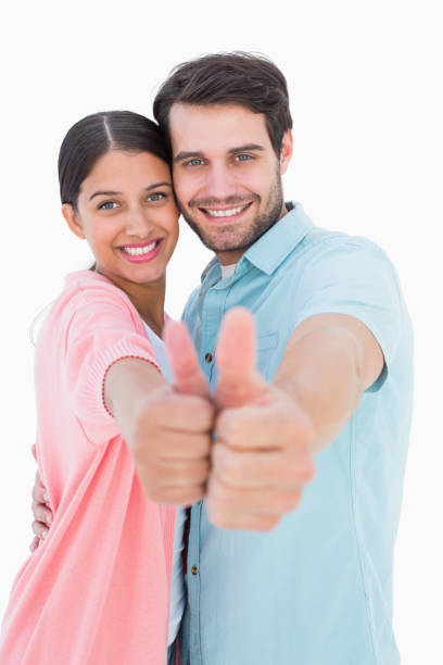 istock Happy couple showing thumbs up 817866212