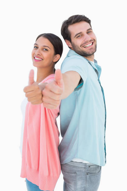 istock Happy couple showing thumbs up 817866314