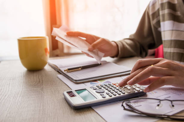 istock people calculate about cost at home ,Finance managers task. 817879794