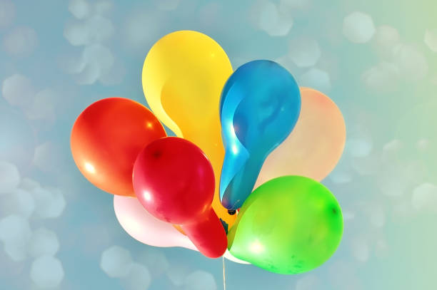 istock Multicolored balloons against the sky 817904480