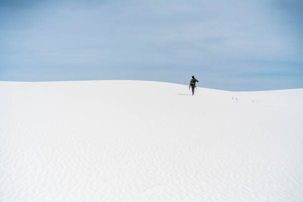 istock The young man, traveller, backpacker, exploring the White Sands National Monument, New Mexico 817928126