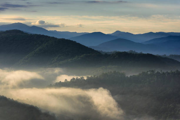 istock Foggy Valley and Mountain Tops at Dawn 817928328