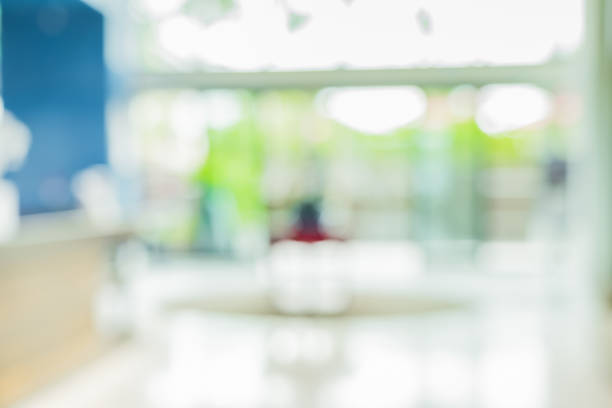 istock Blur background,corridor in convention hall, office building hall way background 817940534