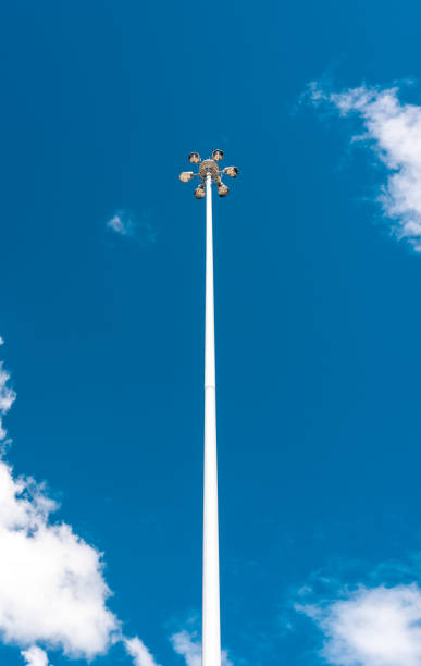 istock Huge white outside lamp on a blue sky 817948220