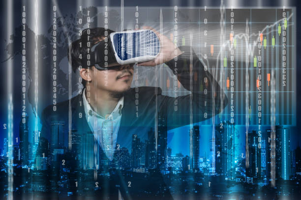 istock Asian Man wearing virtual reality Looking the digital numeric display of security or hacker and showing the trading graph on cityscape and world map  background, VR technology concept 817979484