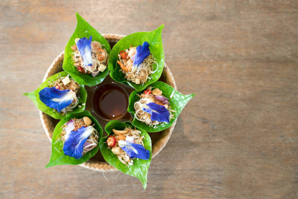 Traditional thai snack Miang Kham or Savoury Leaf Wraps