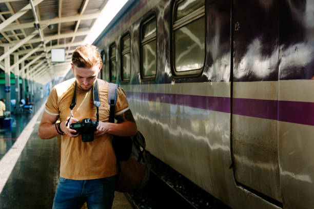istock Photographer Camera DSLR Shooting Journalist Concept 818052324