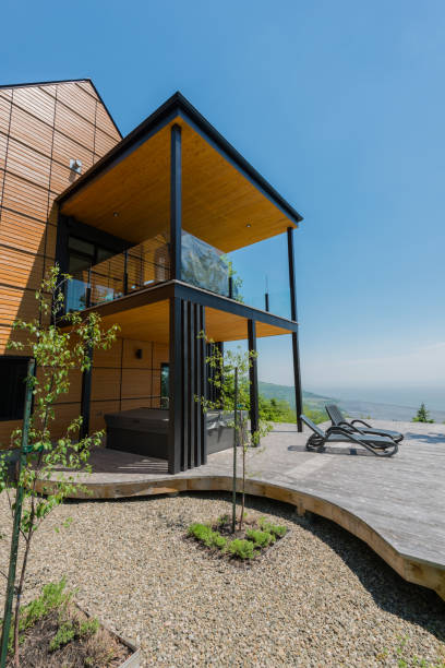 istock Beautiful modern house in the forest. 818058576