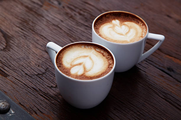 istock Two white cups of coffee 818067970
