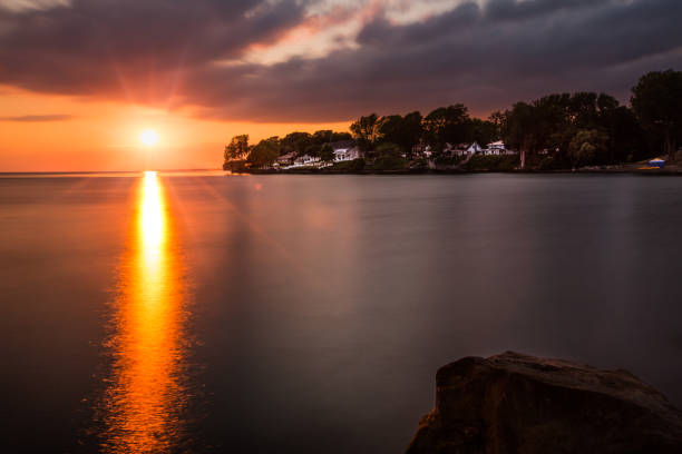 The sun sets in Colchester, Ontario, on the shores of Lake Erie.