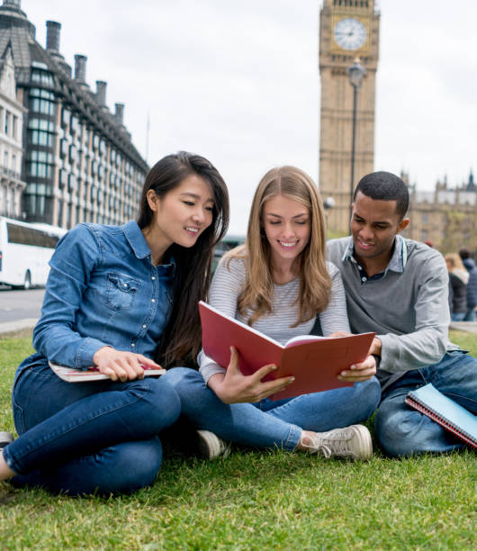 istock Group of people studying outdoors in London 818088088
