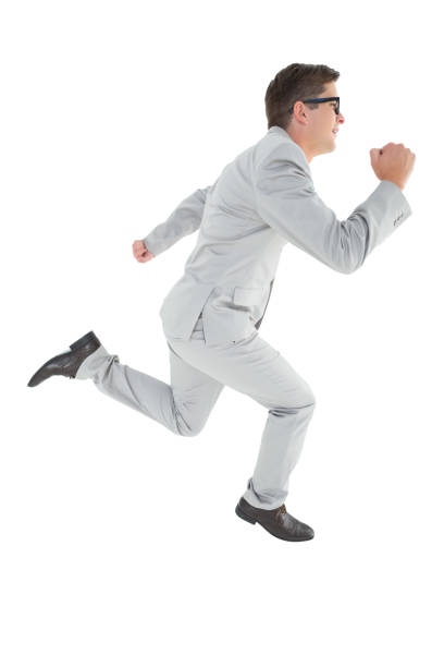 istock Geeky happy businessman running mid air 818112082