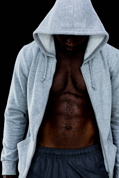 istock Muscular young man in hood jacket 818116842
