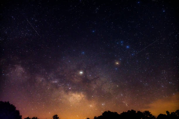 istock Shooting stars and Milky Way 818148500