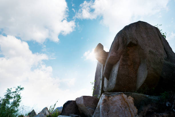 Mountain high rock and cloudy sky