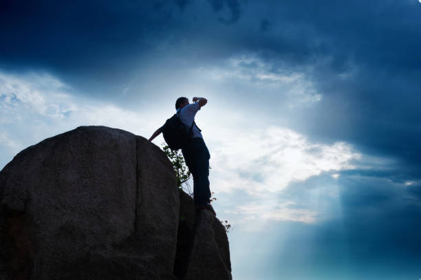 istock Hiker on top of mountain 818169268