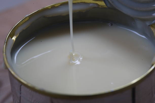 istock Open jar of condensed milk 818177650