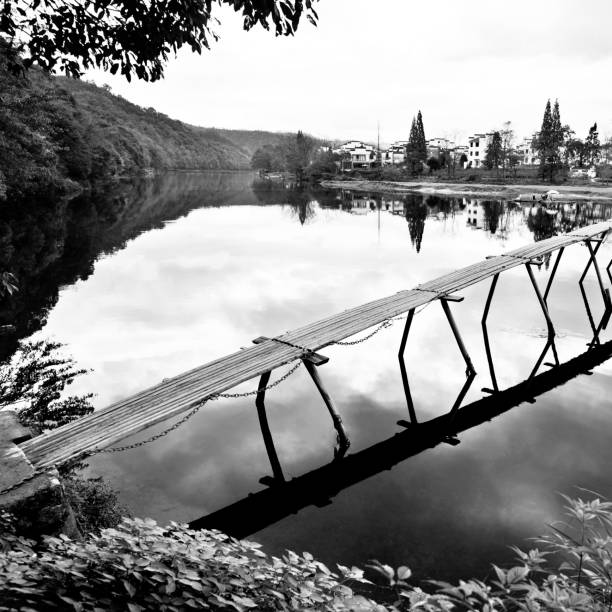istock Old wooden bridge over the lake 818242988