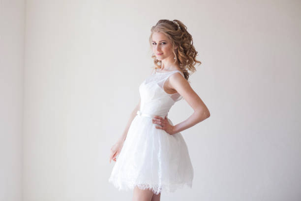 istock beautiful bride posing wedding hairstyle and dress 818250208