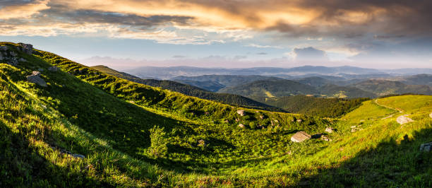 istock panorama of mountain ridge with peak at sunset 818259862