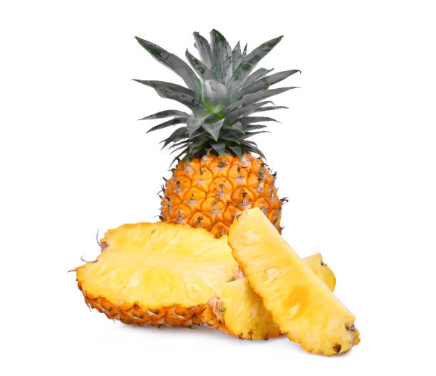 istock ripe whole and half pineapple with slice isolated on white background 818281544