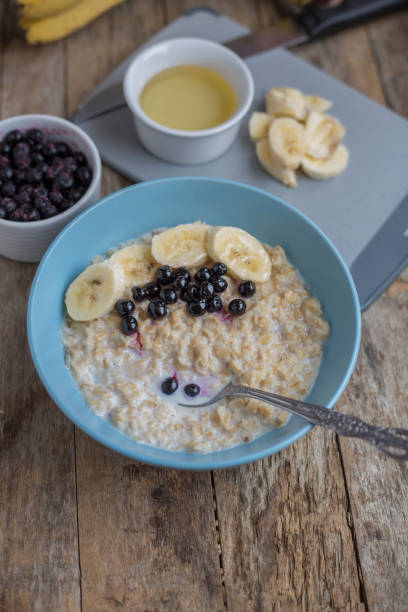 istock Breakfast: oatmeal with bananas and blueberries 818326902
