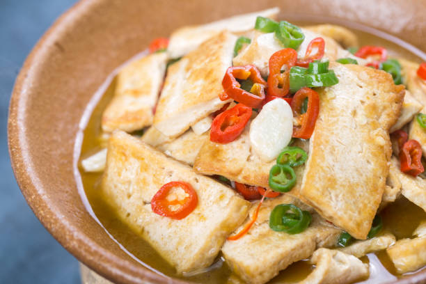 istock stir fried tofu with green and red pepper 818341796