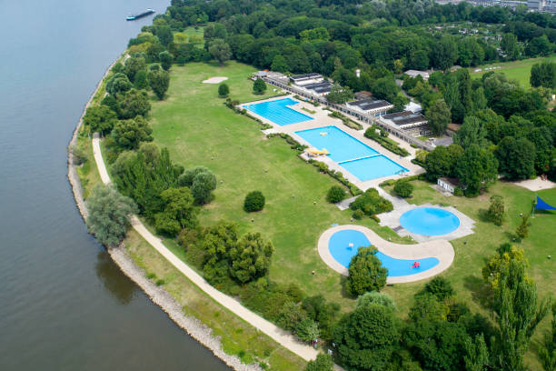 istock Public swimming pool - aerial view 818343874