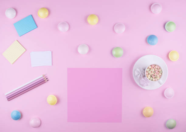 istock Workplace. Sheet of colored paper and pencils. 818358034