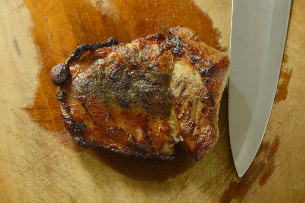 istock pepper pork steak and knife blade 818358272