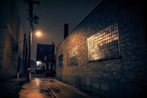 Dark urban city alley at night
