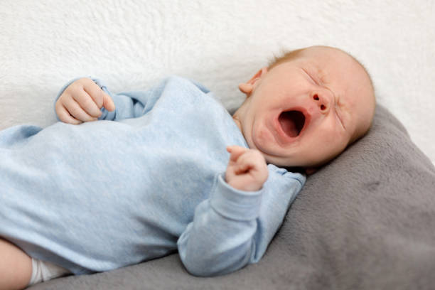 istock crying newborn baby 818365640