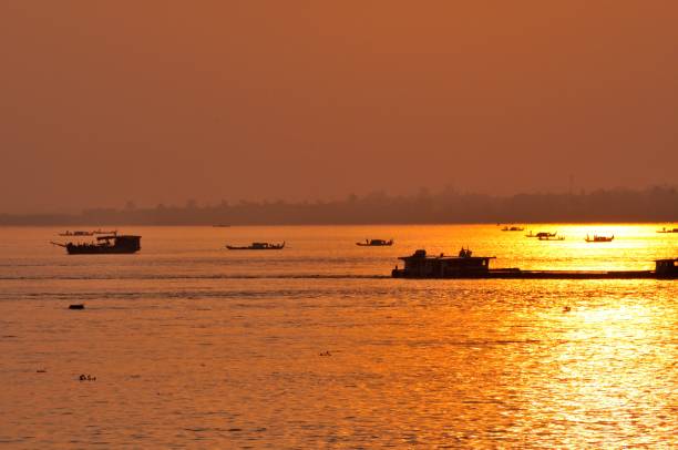 This photo was taken in Phnom Penh, Cambodia, where Mekong River and Tonle Sap River merge and therefore the river is very wide.