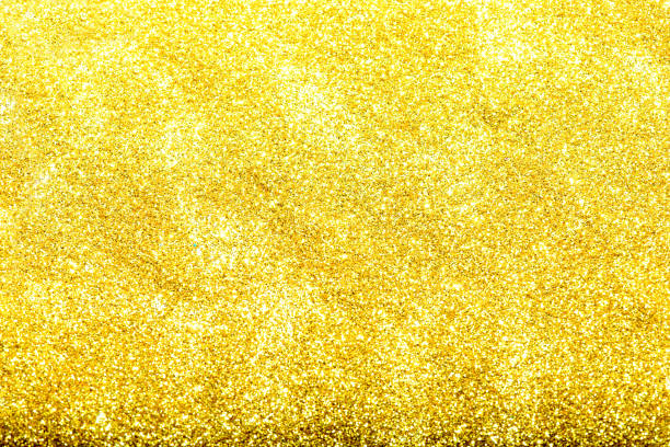 istock Gold glittering christmas lights. Blurred abstract background 818401428