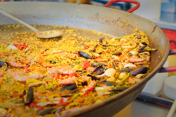 istock STraditional Spanish paella with seafood and chicken. 818436298
