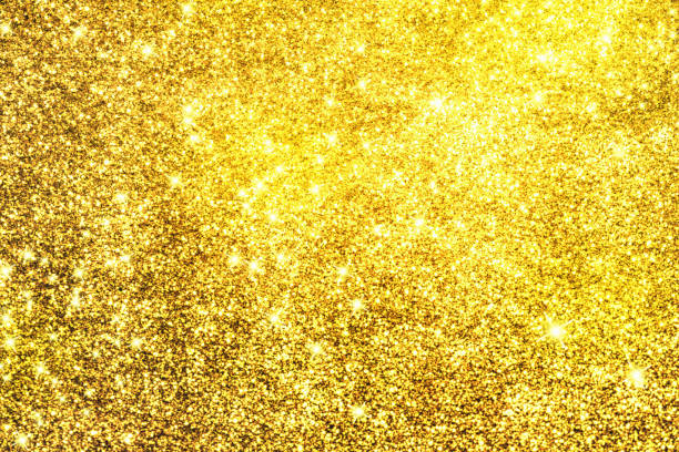 istock Gold glittering christmas lights. Blurred abstract background 818436694