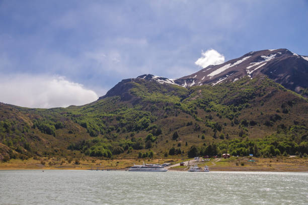 istock Landscape Lago Argentino with snow crapped mountains, blue sky with clouds. 818444286