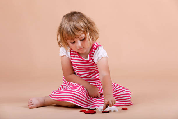 istock three year girl portrait 818446650