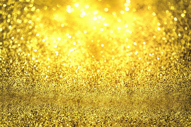 istock Gold glittering christmas lights. Blurred abstract background 818449876