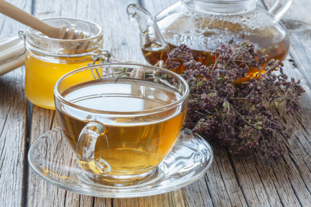 istock Dried herbals for tea and breawed medicine tea 818471986
