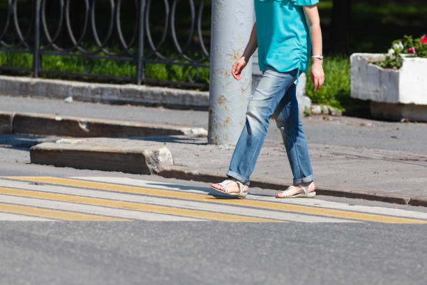 istock Beautiful woman crossing on crosswalk 818481508