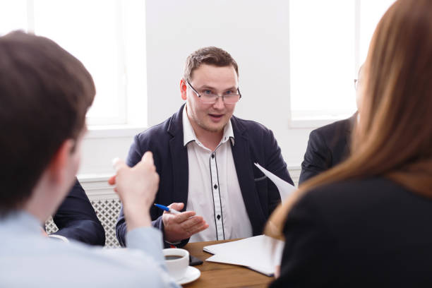 istock Business meeting. Young team in modern office 818527868