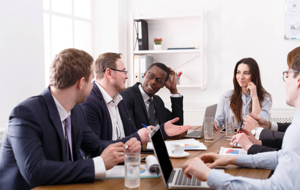 istock Business meeting. Young team in modern office 818528202