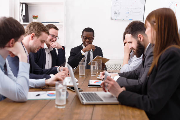 istock Business meeting. Young team in modern office 818528532